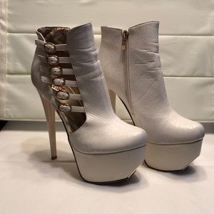 Platform peek through zip-up stiletto ankle boots